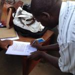 Legal consultation between migrant mineworker and LHR staff in Mozambique